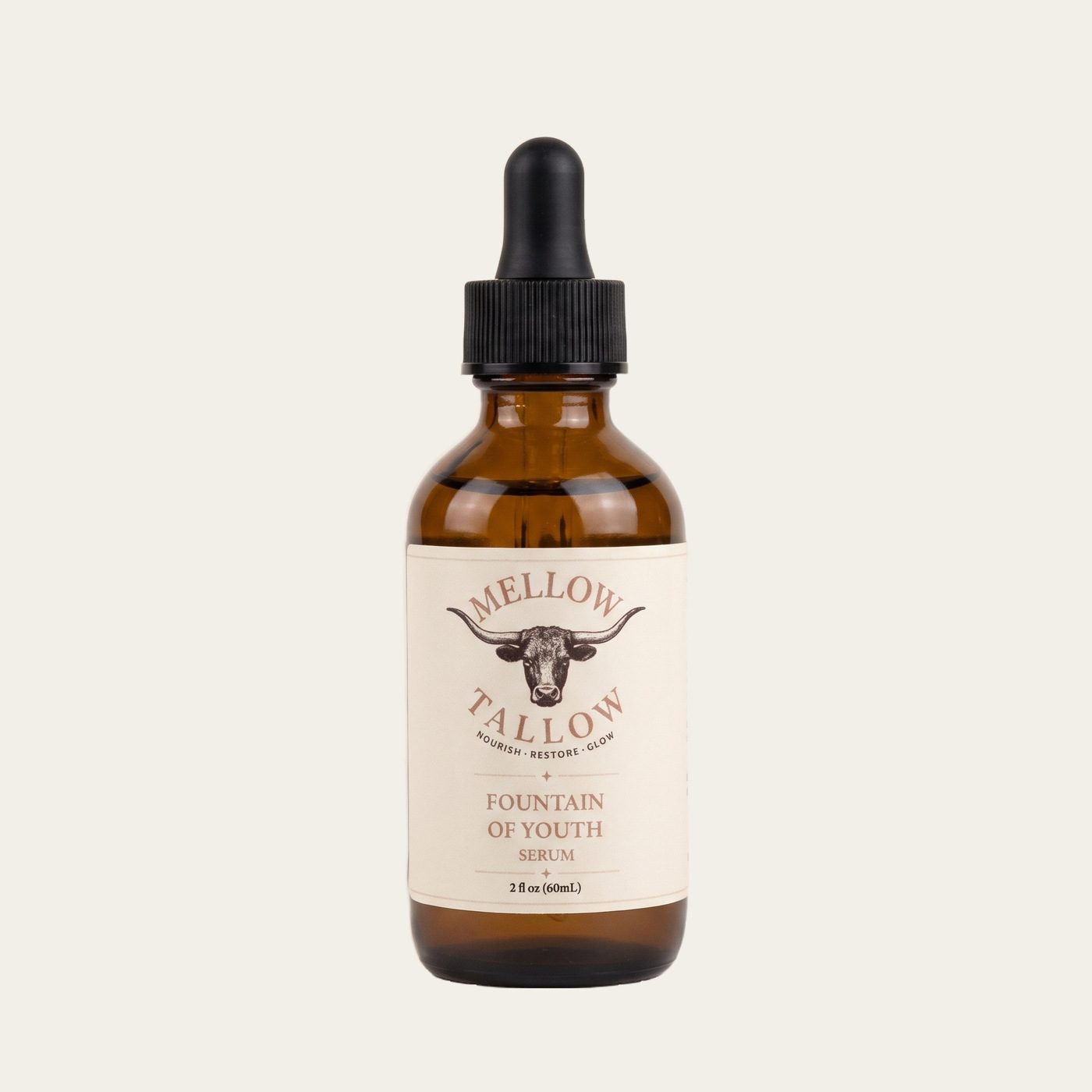 Mellow Tallow Fountain of Youth Serum in an amber dropper bottle